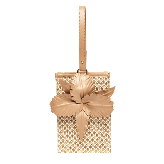 A beige crossbody bag with a floral design and a magnetic snap closure, displayed against a plain background.