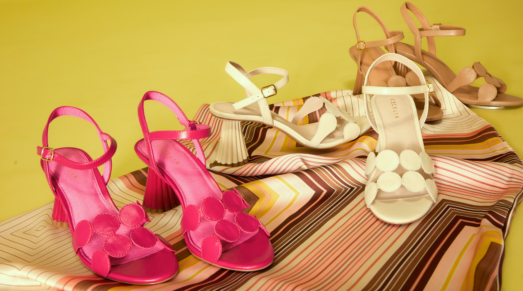 Collection of designer heels in hot pink cream and tan leather by Cecelia New York
