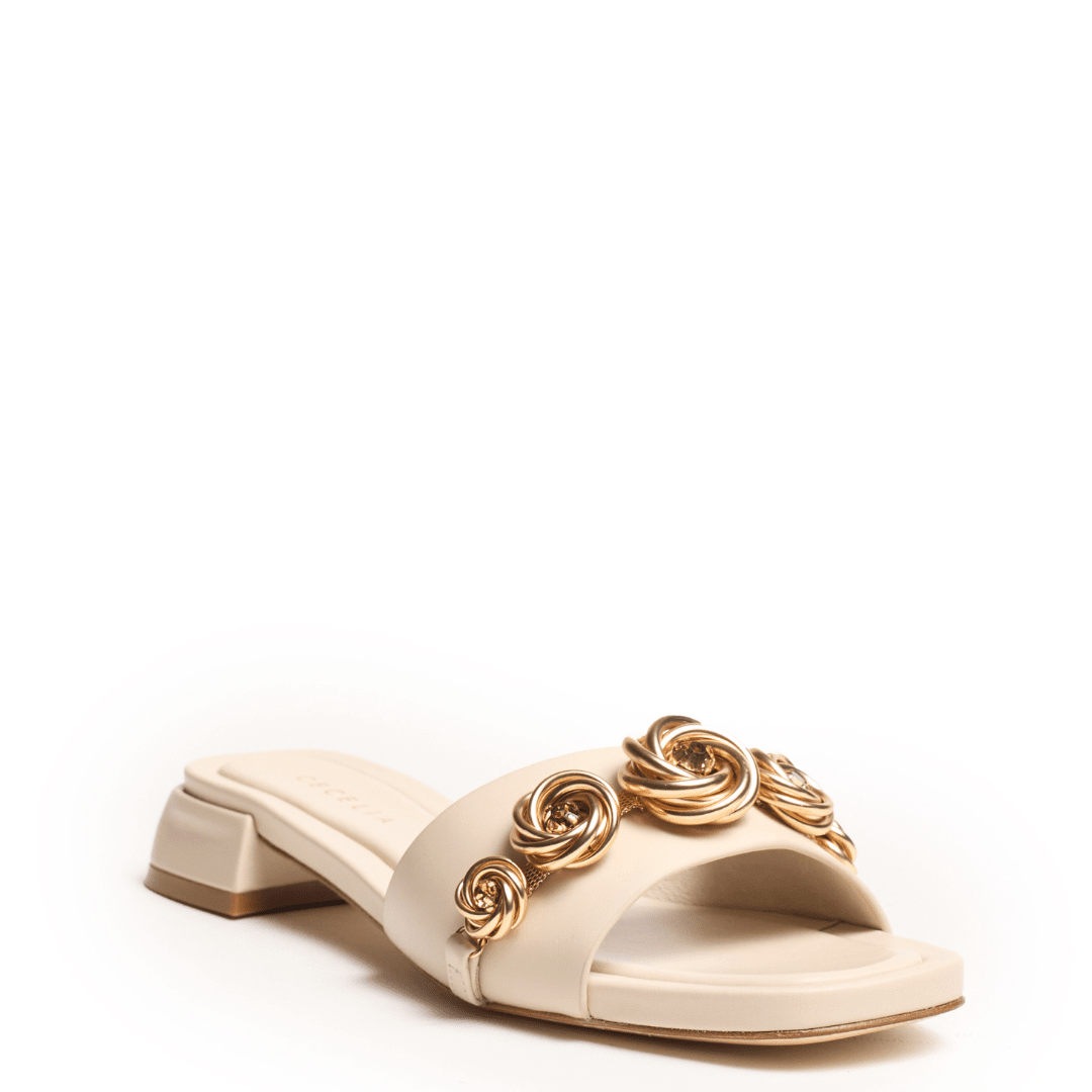 Cream Leather Flat Sandal With Gold Rosette Embellishments on block flat heel