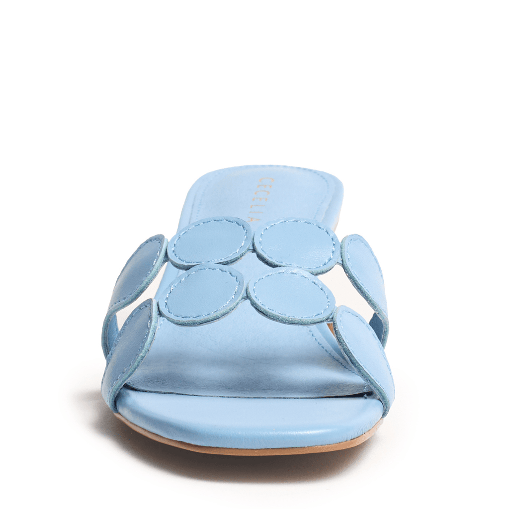 Light blue dress sandal with circular cutout design with hand-dipped kitten heel