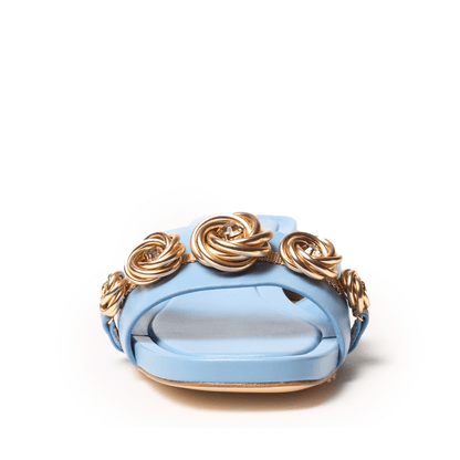 Light blue shoe with gold rose decorations 