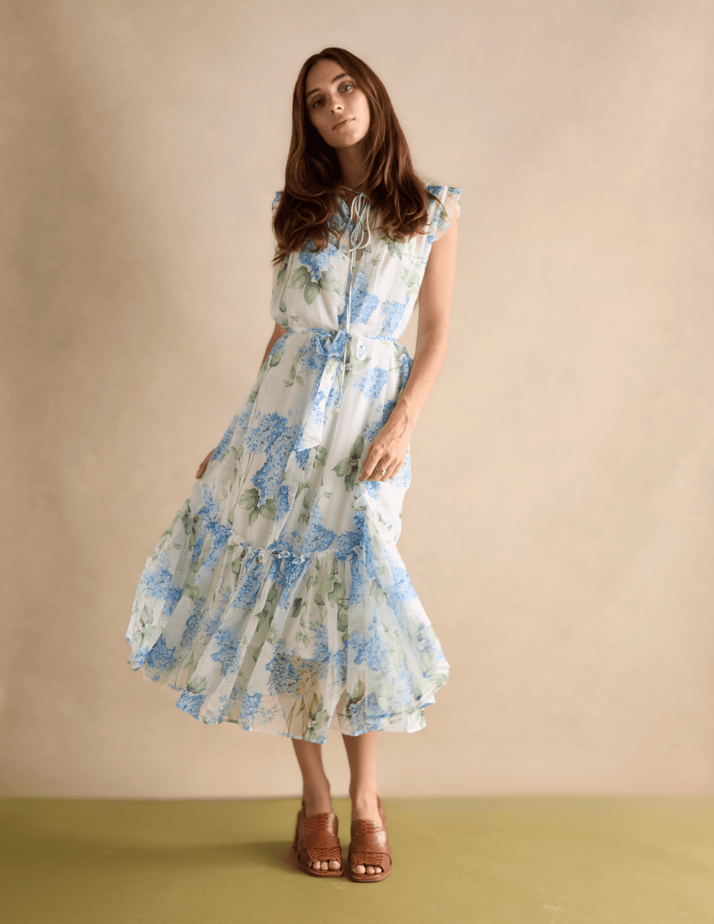 Woman wearing a floral dress Cecelia New York