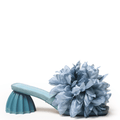 Blue slide with a large accent flower on vamp sculpture heel mid height