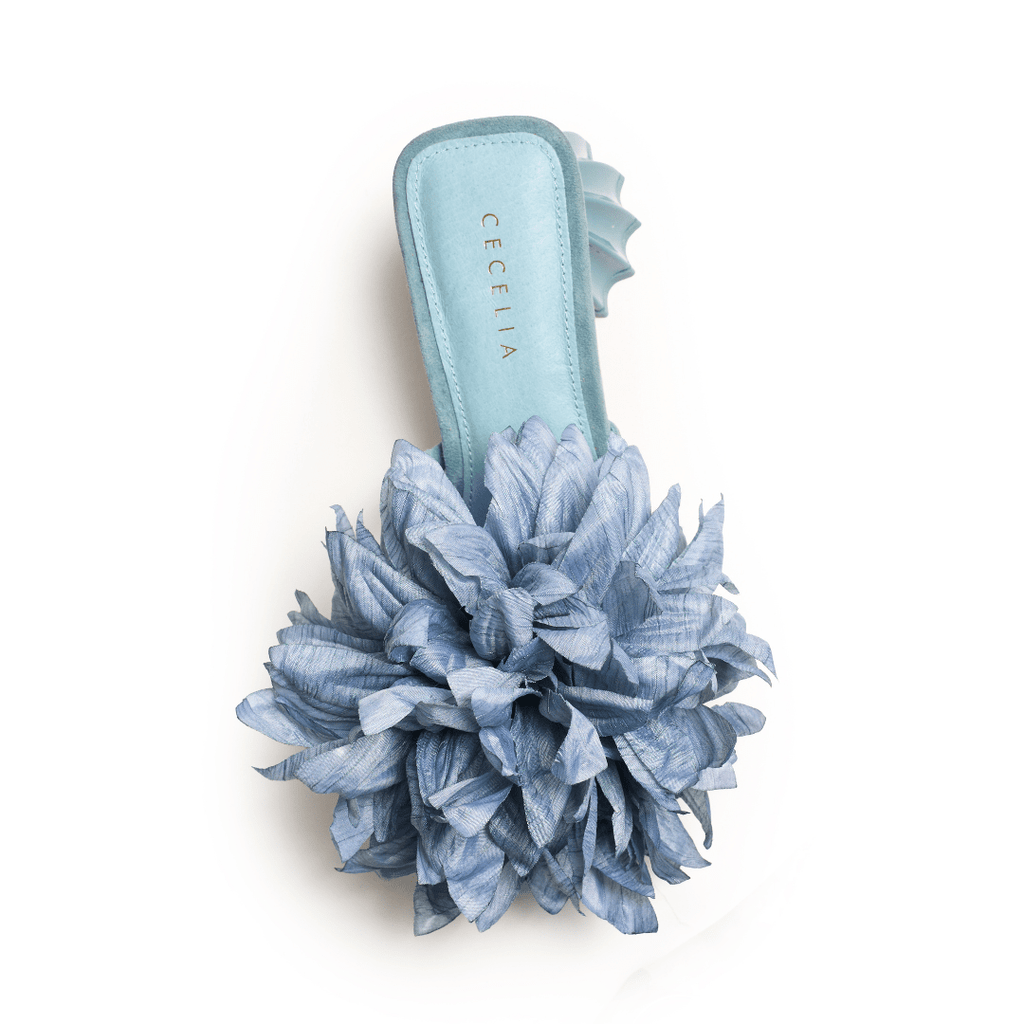 Light blue sandal with oversized flower