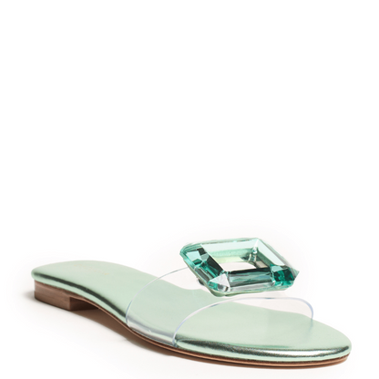 Mint green metallic slide sandal with a clear strap and green gemstone