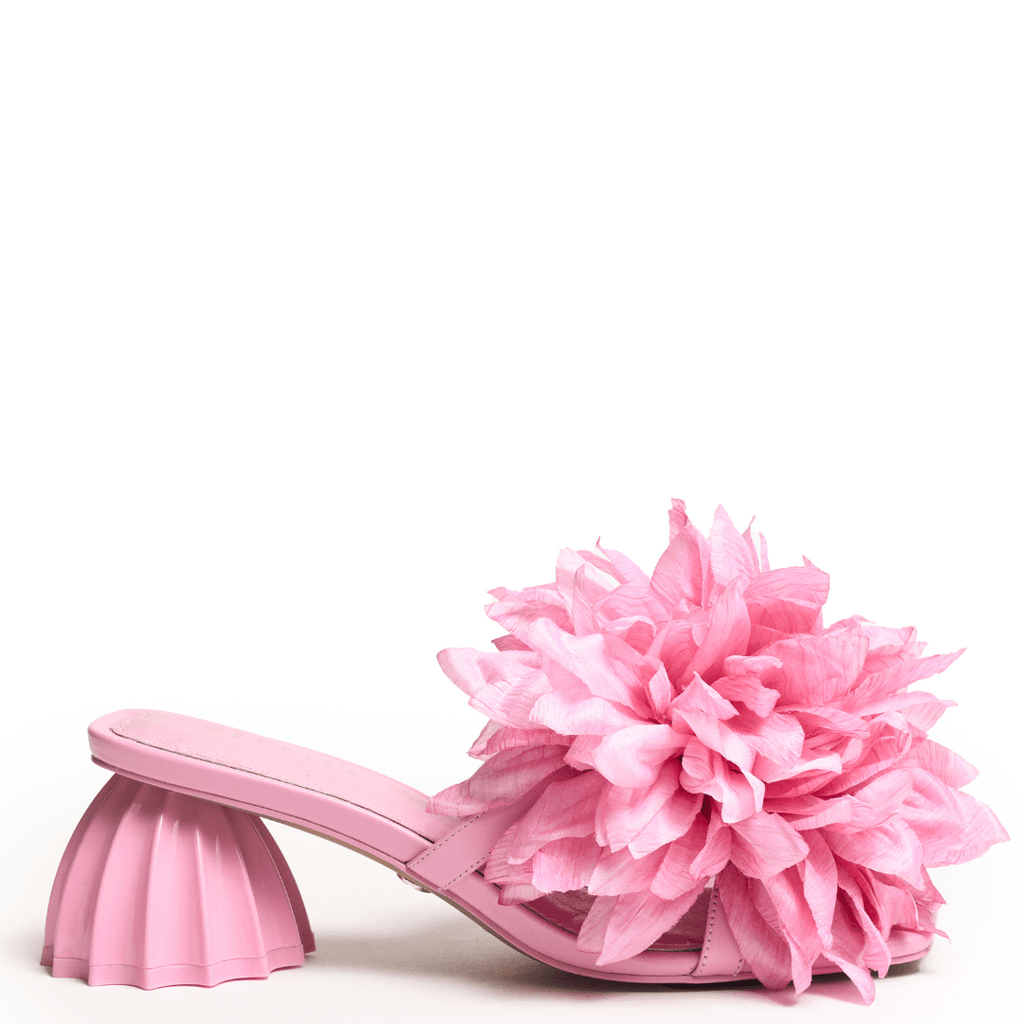 slip on soft pink sandal with large pink flower accent 