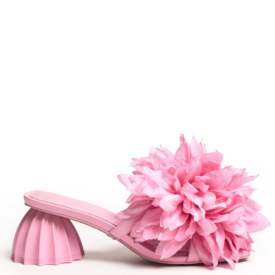 slip on soft pink sandal with large pink flower accent 