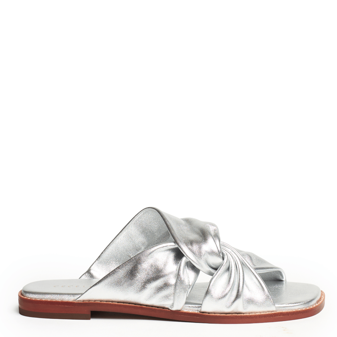 Silver flat sandal with a knotted design 