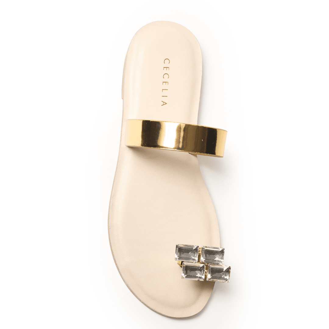 Metallic gold sandal with strap and crystal toe embellishment