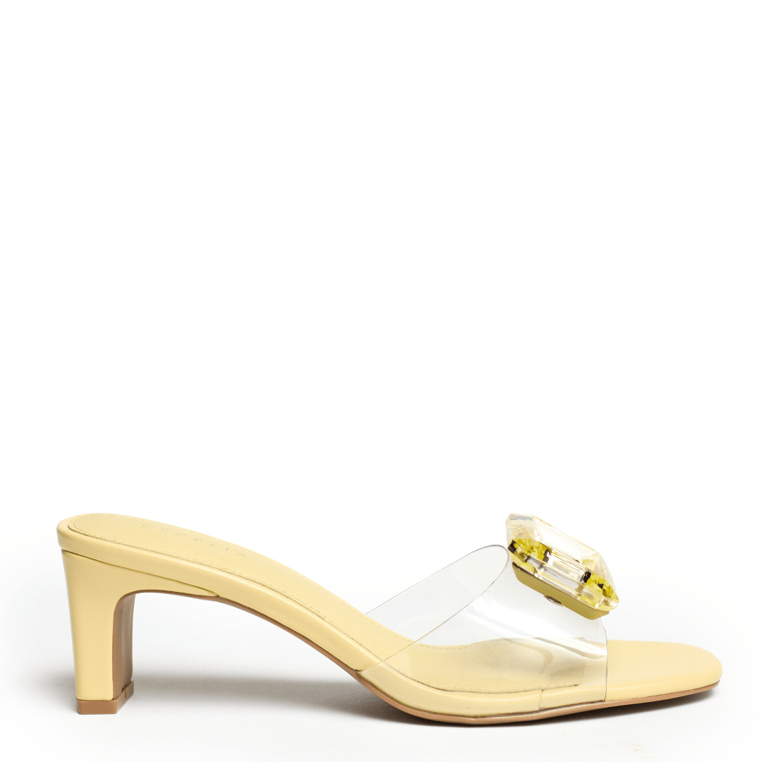 yellow slide sandal with oversized yellow gem soft leather clear vamp
