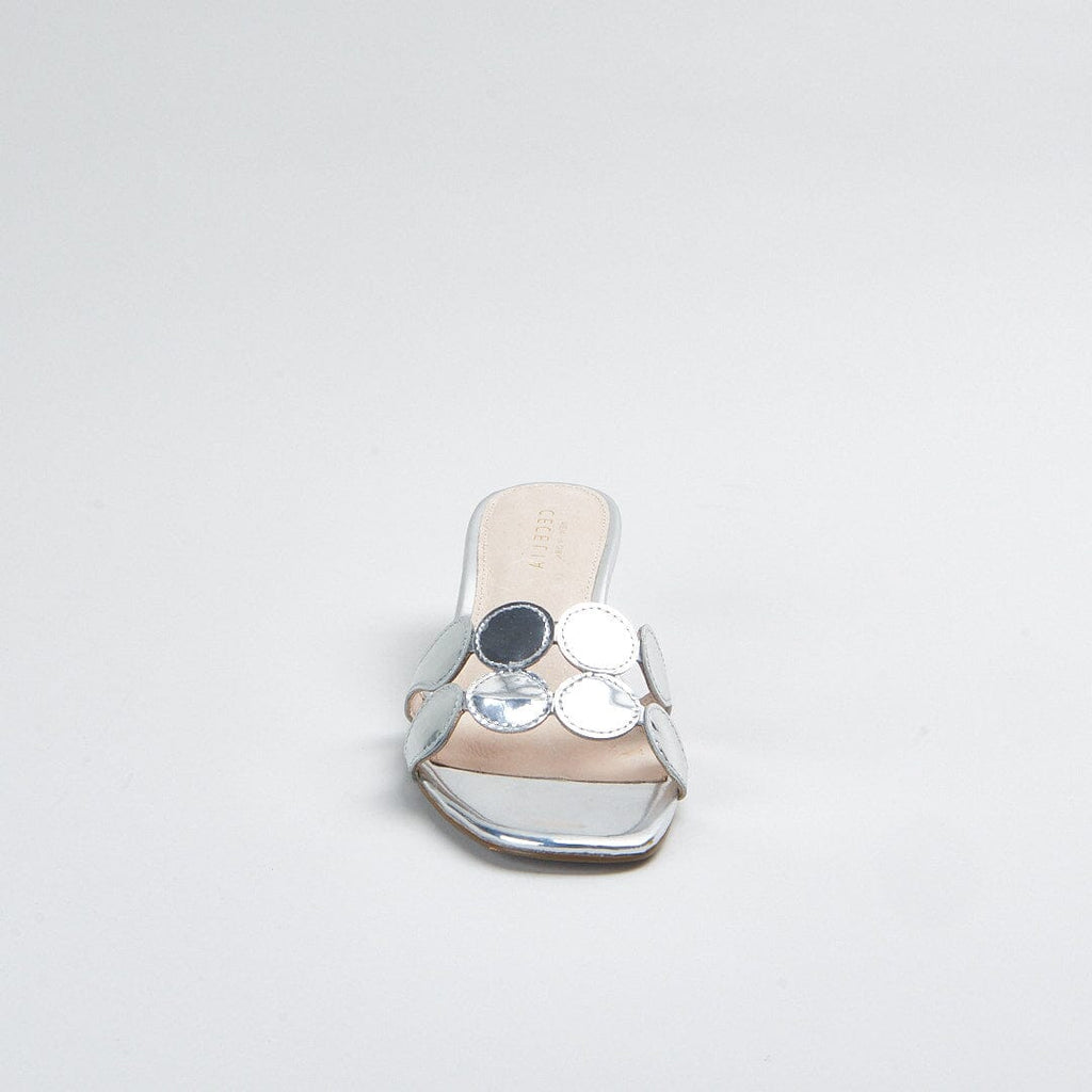 A dressy silver sandal slide