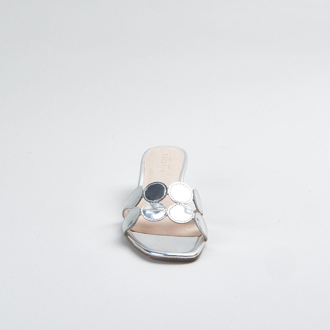 A dressy silver sandal slide